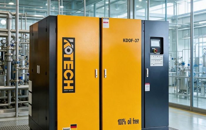 KOTECH KDOF dry oil-free screw compressor in a chemical plant instrument-air utility room with stainless process piping